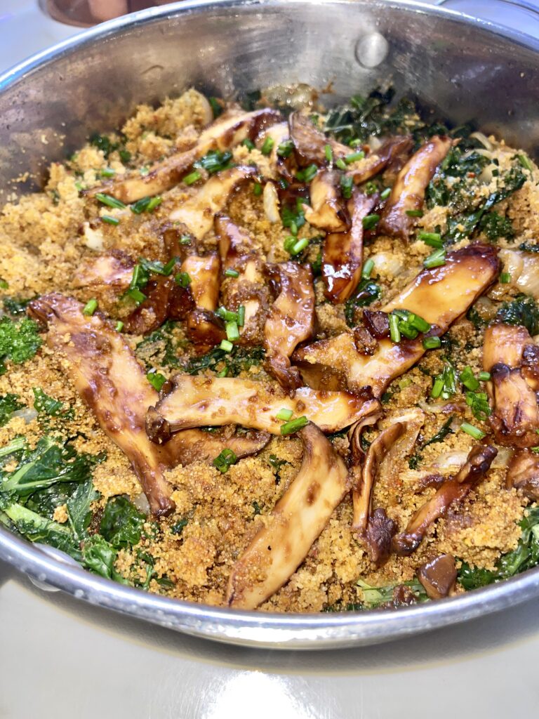 Ready bourbon-glazed king trumpet mushrooms with kale and fonio