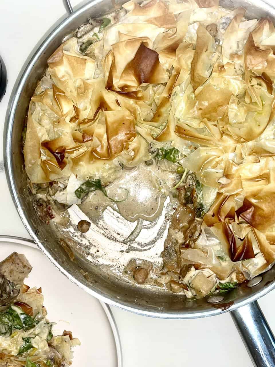 Golden crispy spring rolls with fresh vegetables and herbs, perfect for healthy eating and wholesome recipes.