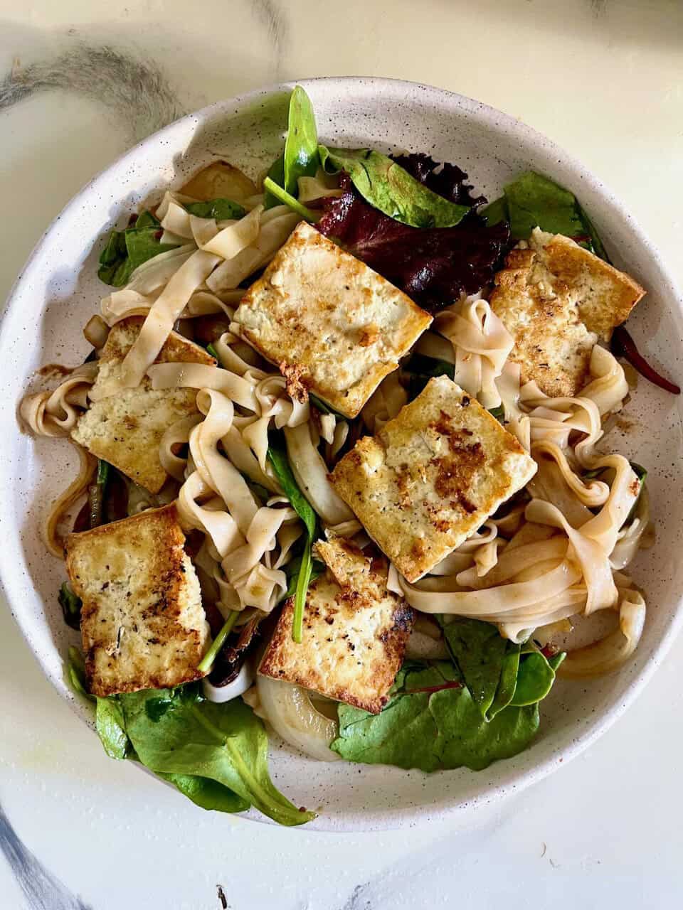 Tofu salad with mixed greens and fettuccine pasta, healthy plant-based meal, Make Pure Thy Heart.