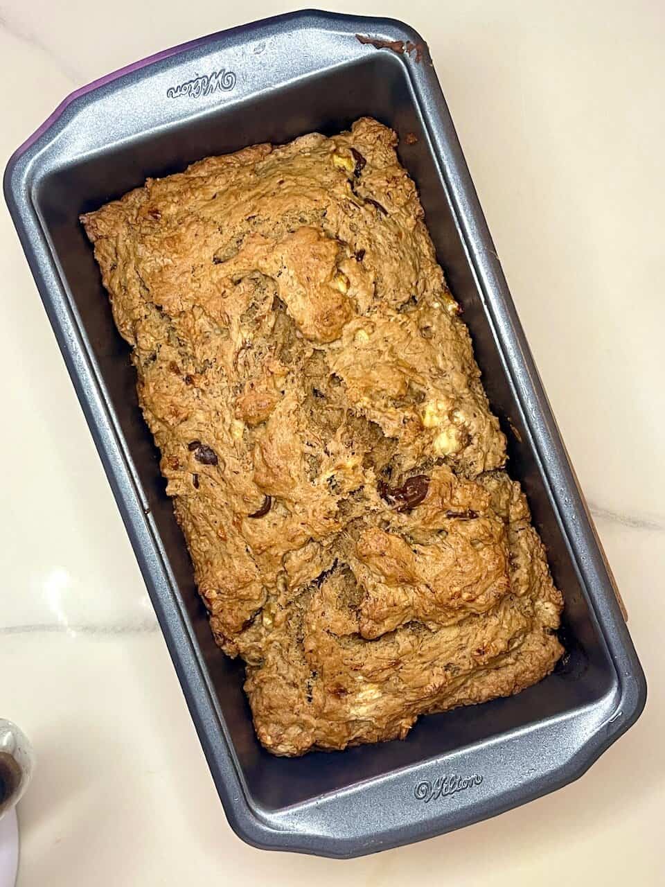 Gooey vegan cookie dough in a metal baking pan, homemade sweet treat, healthy baking recipe, Make Pure Thy Heart.