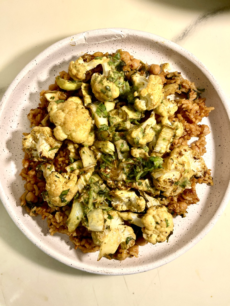 Chickpea vegan chorizo with cauliflower and brown rice in bowl.